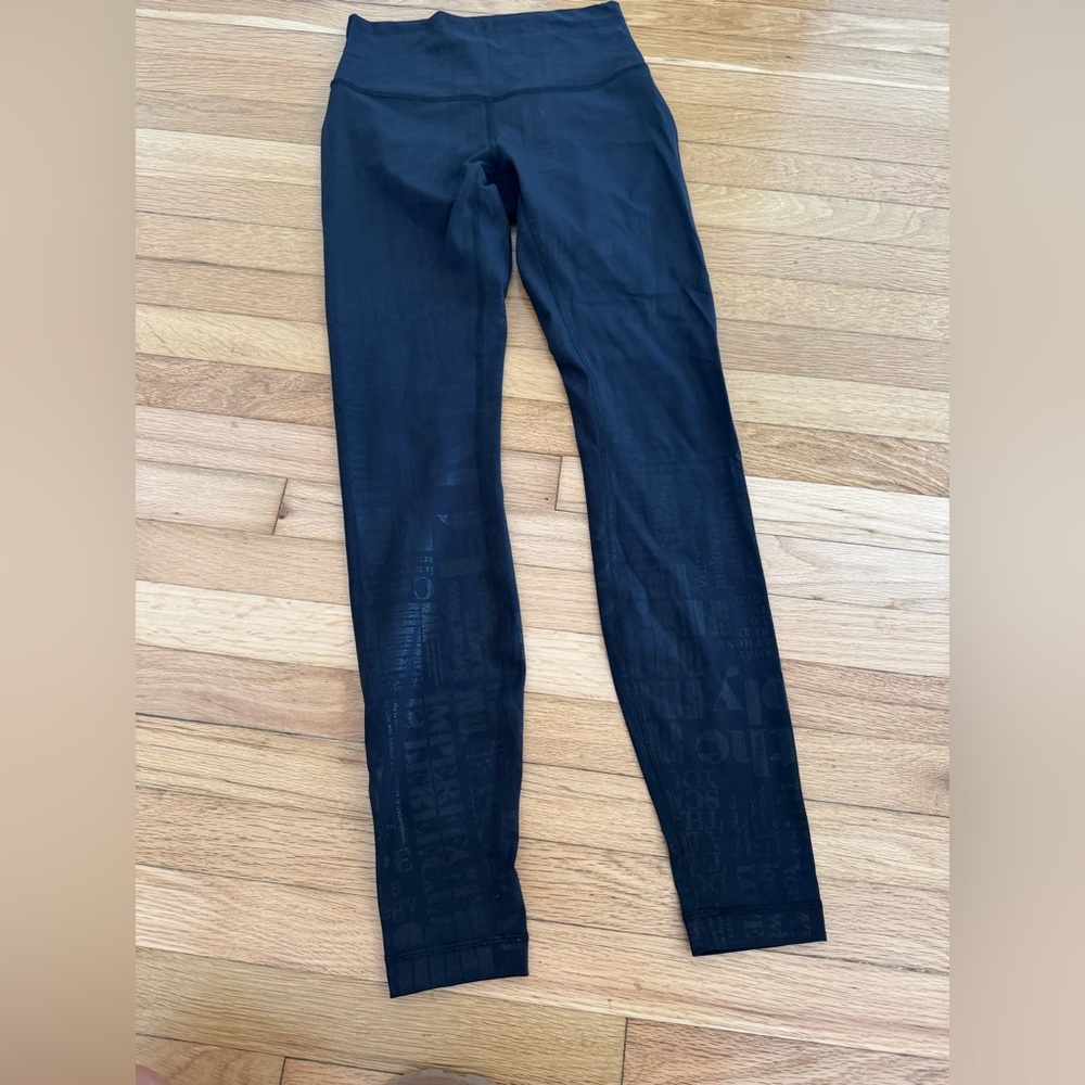 Lululemon Wonder Train Black Shimmer Writing Quotes Leggings Size 4